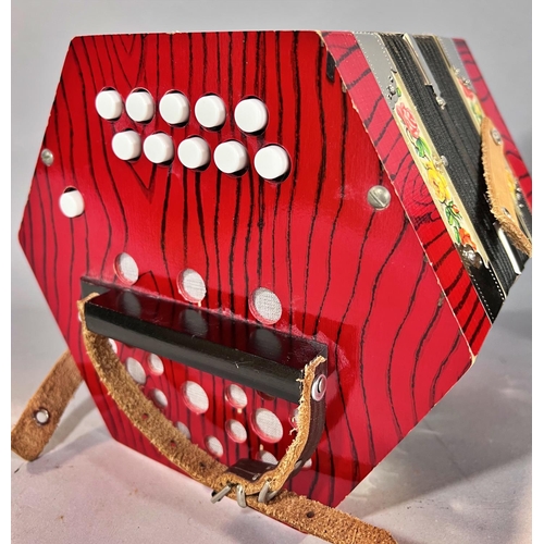 1549 - A red Hohner accordion made in Germany, in working order, and a red concertina Made in  Germany, in ... 