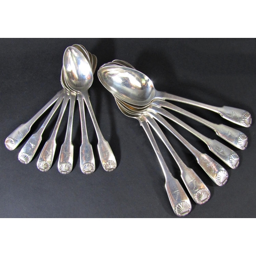 1237 - Georgian silver flatware comprising six serving spoons, six dessert spoons, six main forks, six side... 