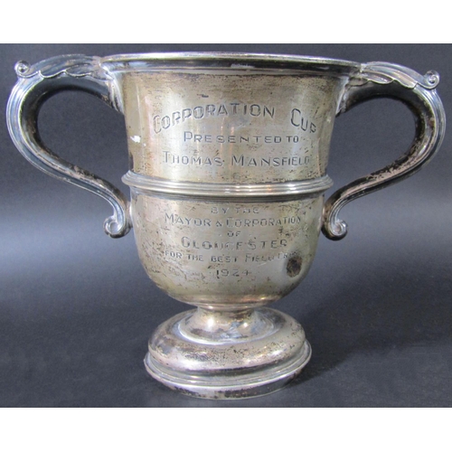 1240 - A Walker & Hall silver double handled trophy 17cm high, 17oz approx and a quantity of silver plated ... 