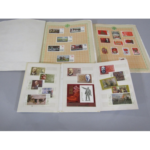 306 - Three small stamp albums all containing Russian stamps