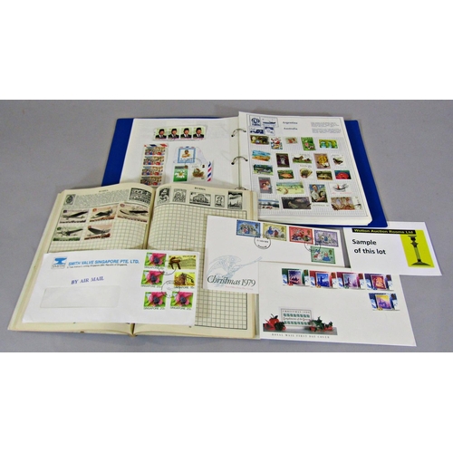 307 - A collection of stamps to include worldwide examples and some from Guernsey in two albums