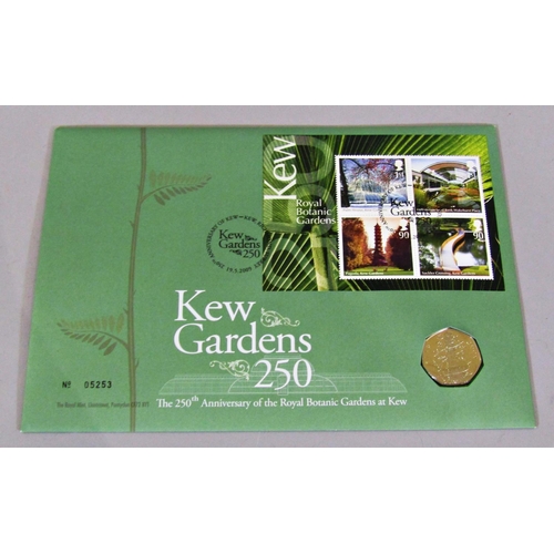 312 - 32 limited issue commemorative stamp/coin sets including 2009 Kew Gardens 50p, others containing £5,... 