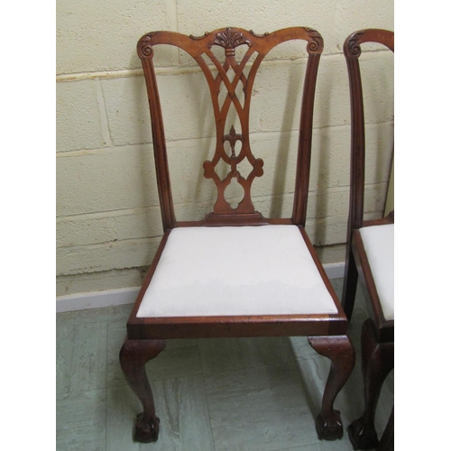 2480 - A set of eight Georgian style mahogany dining chairs with interlaced splats, shaped cresting rails, ... 