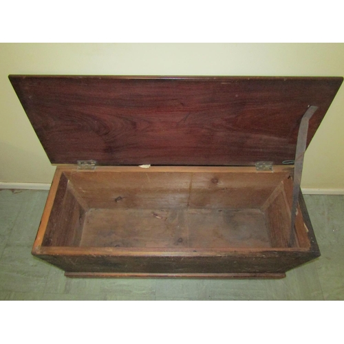 2487 - A pine blanket chest with mahogany top, 118 cm in width