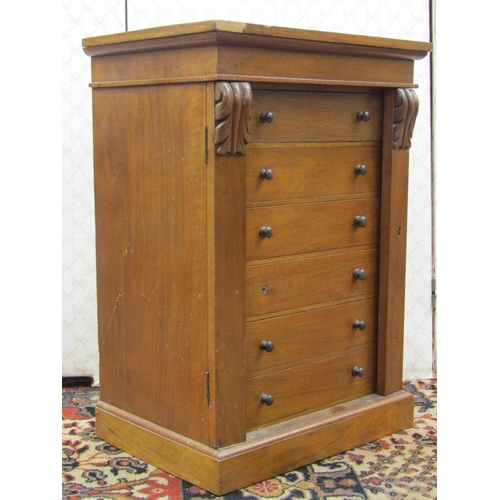 2586 - A small Victorian mahogany Wellington chest of six drawers with rocking mechanism, with acanthus sha... 