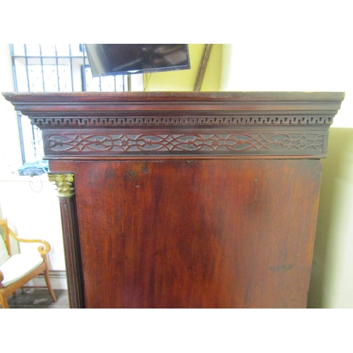 2645 - A Georgian mahogany chest on chest fitted with six long and two short graduated drawers, the upper s... 