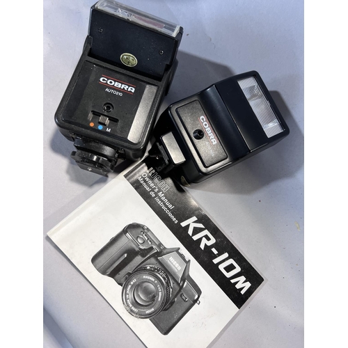 1548 - Photographic equipment: two Ricoh cameras a KR 10 and a KR10 Super, two telescopic lens, two camera ... 