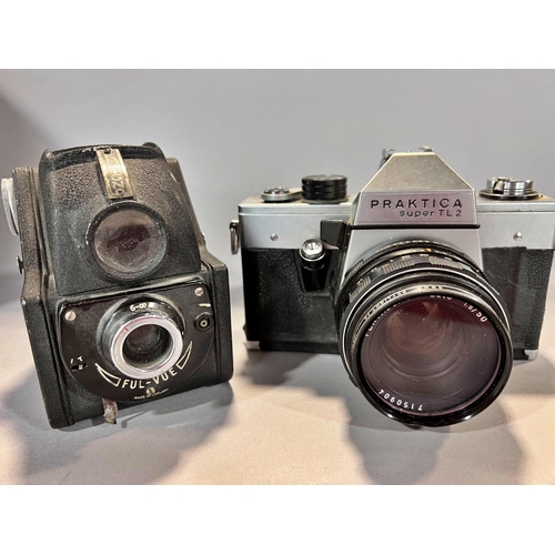 1548 - Photographic equipment: two Ricoh cameras a KR 10 and a KR10 Super, two telescopic lens, two camera ... 