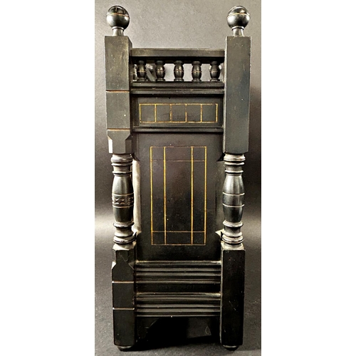 1363 - A Victorian mantle clock in the aesthetic style, the ebonised case with geometric detail and gilt hi... 