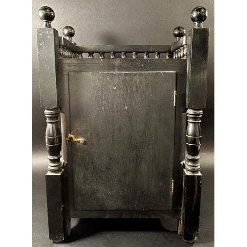 1363 - A Victorian mantle clock in the aesthetic style, the ebonised case with geometric detail and gilt hi... 