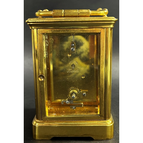 1366 - Victorian brass cased carriage clock, with enamelled dial and eight day time piece