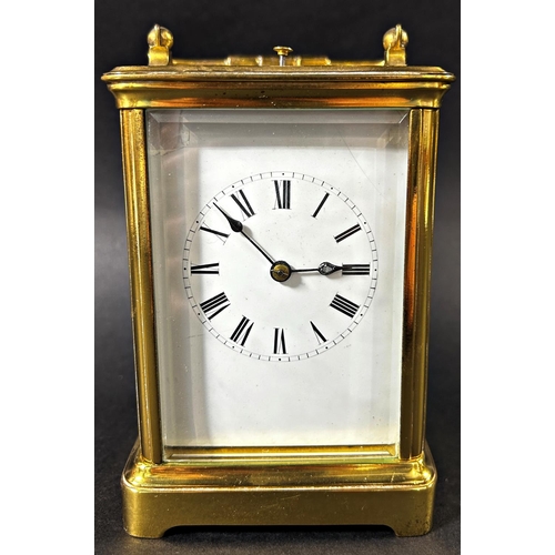 1367 - A late 19th century French carriage clock with enamelled dial and eight day striking movement, with ... 