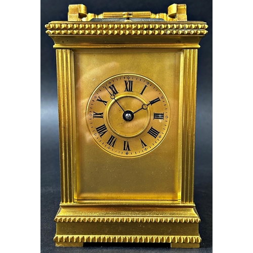 1368 - 19th century French carriage clock, the brass case with reeded columns, set within dog tooth borders... 