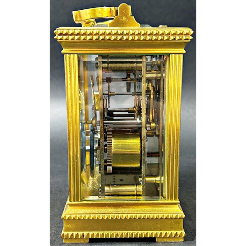 1368 - 19th century French carriage clock, the brass case with reeded columns, set within dog tooth borders... 