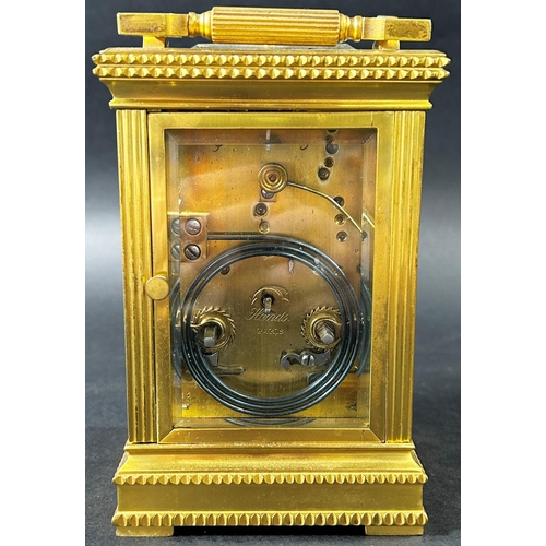 1368 - 19th century French carriage clock, the brass case with reeded columns, set within dog tooth borders... 