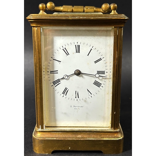 1372 - A brass carriage clock with eight day striking movement together with a further mantle clock in the ... 