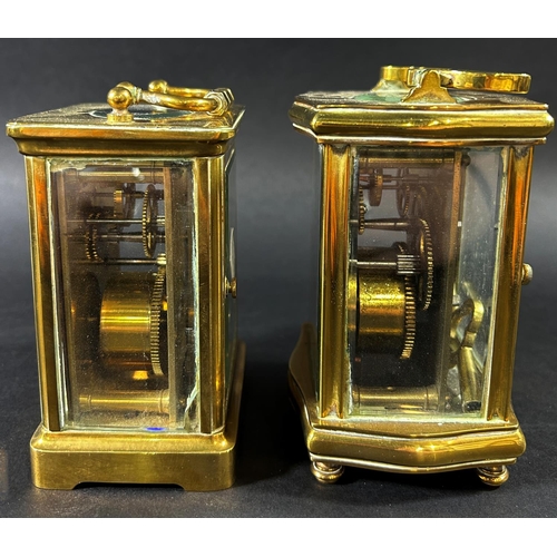 1374 - A brass carriage clock, the case with shaped outline, enclosing an enamelled dial and eight day time... 