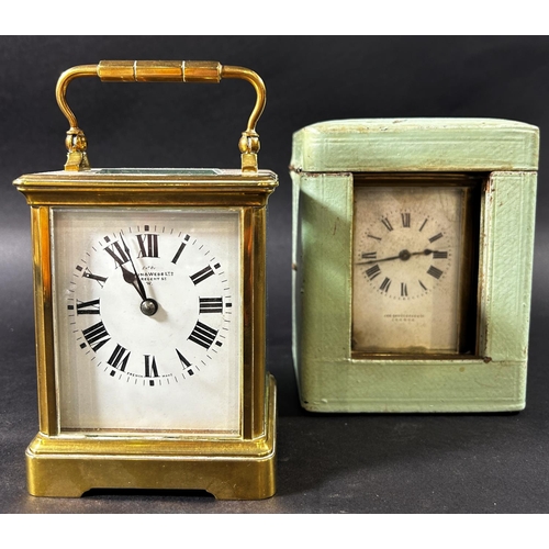 1376 - A brass carriage clock with square enamelled dial retailed by Mappin & Webb, together with a further... 