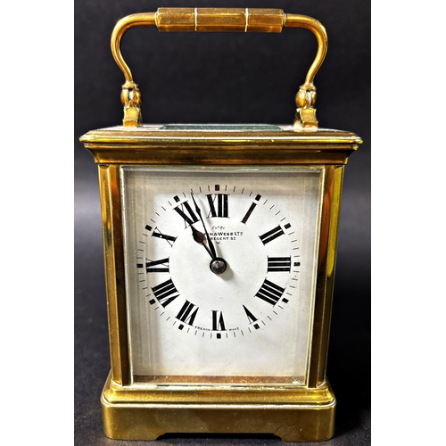 1376 - A brass carriage clock with square enamelled dial retailed by Mappin & Webb, together with a further... 