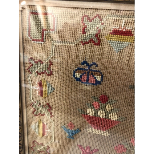 157 - A 19th Century Tapestry Sampler, by Margaret Blanton, depicting a pheasant, 41 x 53 cm, framed and g... 