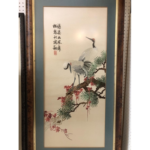 146 - Three Framed Works: Chinese silk embroidery of two cranes, with embroidered inscription and red seal... 