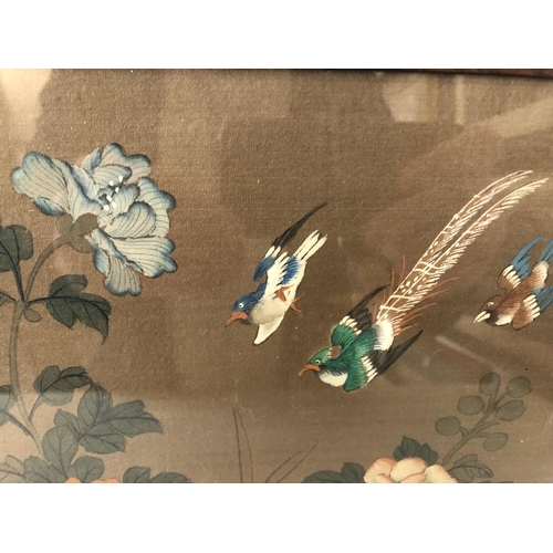 126 - Two Chinese Paintings on Silk of Birds and Flowers in carved hardwood frames, 27 x 22 cm (2)