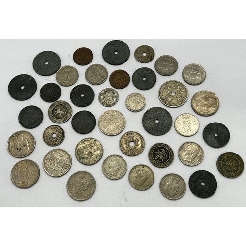 1384 - A quantity of 20th century foreign coinage Denmark, Cyprus, East Africa, Belgium, Holland, France, e... 