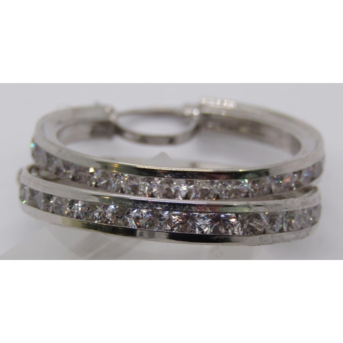 1314 - Pair of 9ct white gold hoop earrings channel set with cubic zirconia, 5g