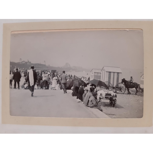 319 - Three albums containing a collection of late 19th century photographs with scenic views of the Briti... 