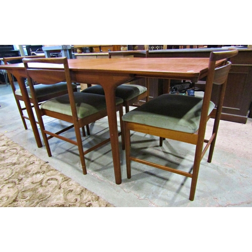 2285 - A Macintosh of Kilcardy teak pull out extending dining table, with bi folding leaves, rounded corner... 