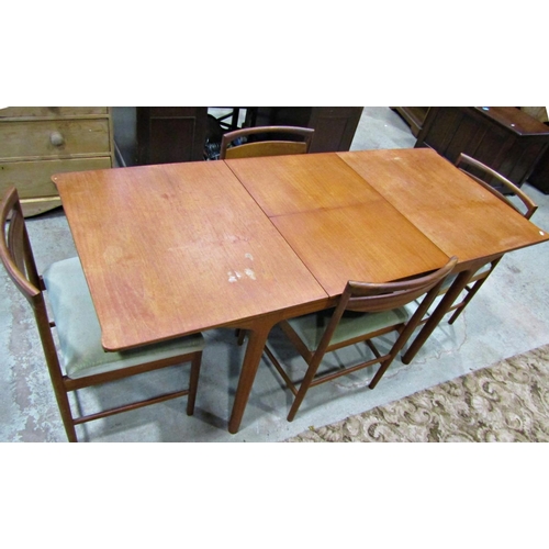 2285 - A Macintosh of Kilcardy teak pull out extending dining table, with bi folding leaves, rounded corner... 