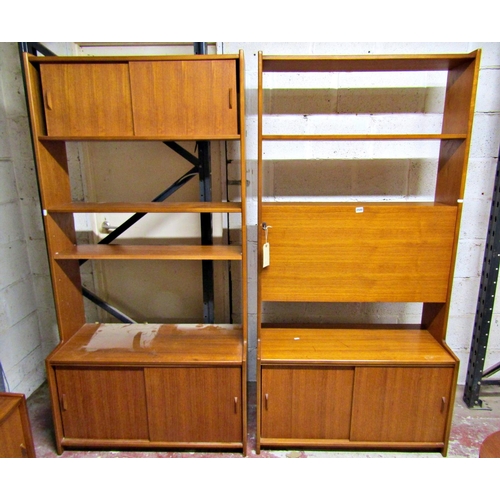 2500 - Three high back teak units one incorporating a bureau, one a cocktail cabinet, the other shelves, al... 