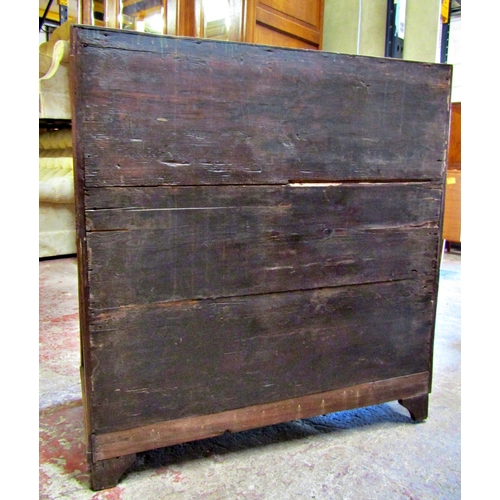 2514 - An 18th century oak country made bureau of two long and two short drawers, the fall flap revealing a... 