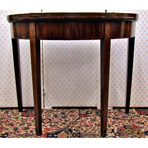 2606 - A Georgian mahogany demi lune foldover top tea table on square taper legs with inlay detail, 93cm di... 