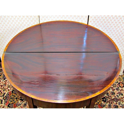 2606 - A Georgian mahogany demi lune foldover top tea table on square taper legs with inlay detail, 93cm di... 