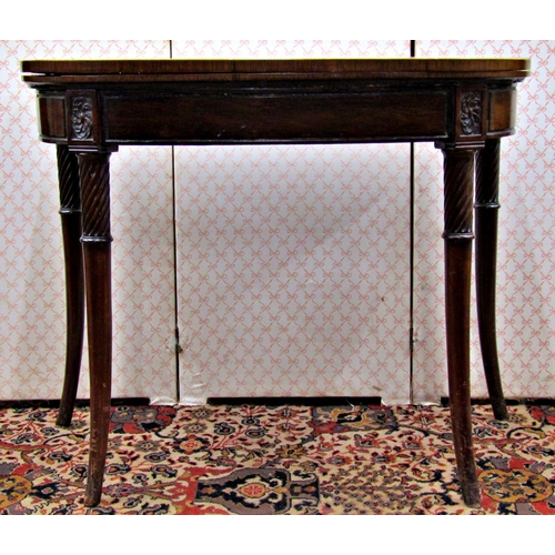 2620 - A Regency mahogany D end foldover top card table, raised on four turned and splayed supports, with a... 