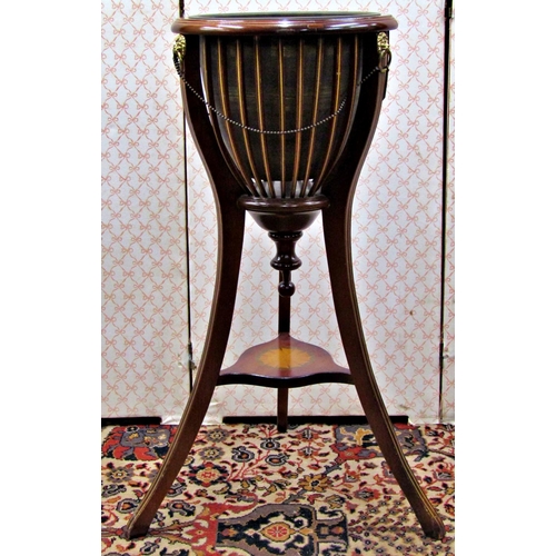 2670 - A good quality reproduction mahogany jardinière with inlaid detail on swept support