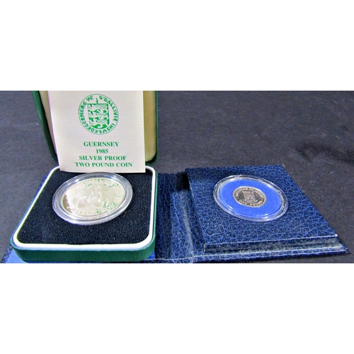 1409A - Pobjoy mint virenium proof £1 coin, Philippines 100 Piso silver coin, 1983 uncirculated, 1977 silver... 