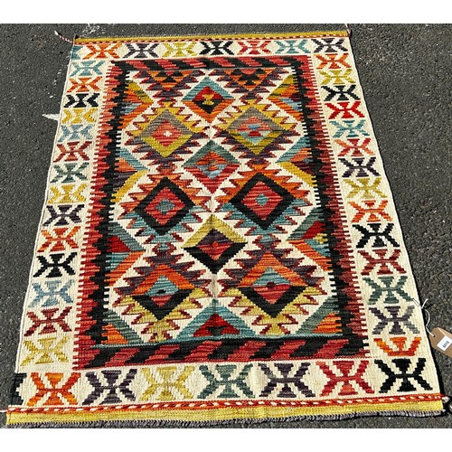 1628 - A Chobi Kilim with an all over colourful stepped diamond pattern, 148cm x 102cm  approx.