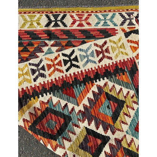 1628 - A Chobi Kilim with an all over colourful stepped diamond pattern, 148cm x 102cm  approx.