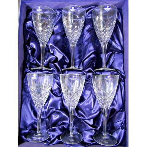 1149 - A boxed set of six large Edinburgh Crystal cut glass wine glasses.