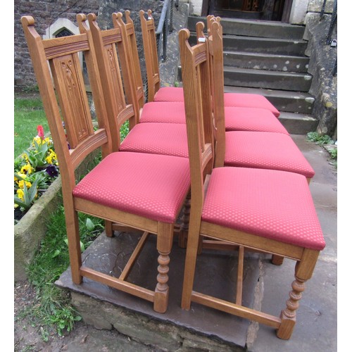 2593 - An oak refectory table, the heavy plank top raised on a simple stretcher base united by a central ra... 