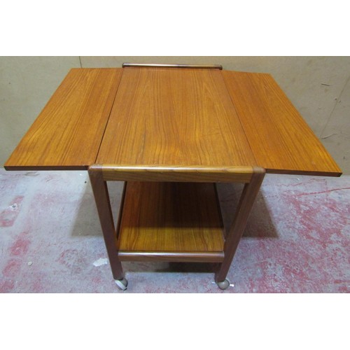 2441 - A mid-20th century teak wood drop leaf tea trolley on castors