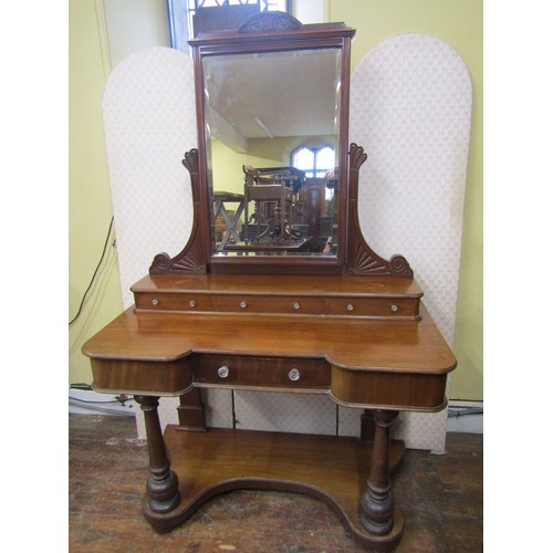 2616 - A Victorian mahogany bedroom suite comprising a small breakfront three door wardrobe with mirror pan... 