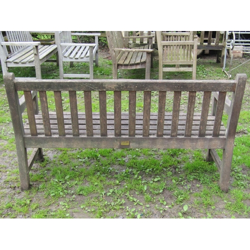 11 - A Lansdale weathered teak garden bench with slatted seat and back 150 cm wide