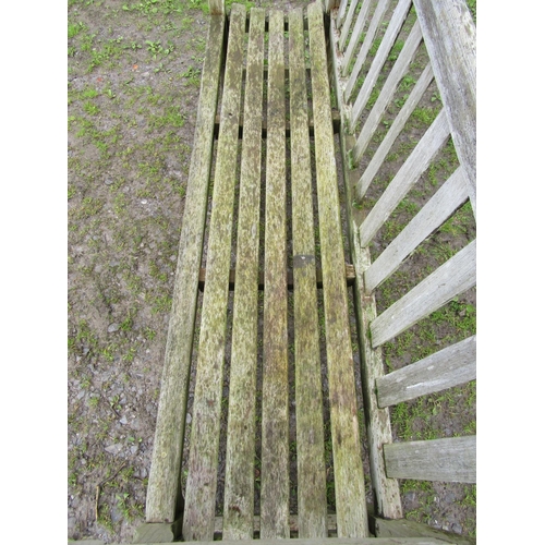 18 - A vintage heavy gauge weathered teak garden bench with slatted seat and back (stamped to side rail L... 