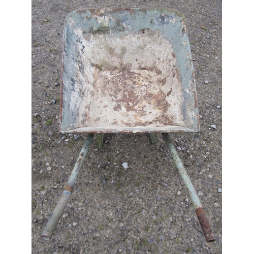 21 - A vintage wheelbarrow with iron spoke wheel