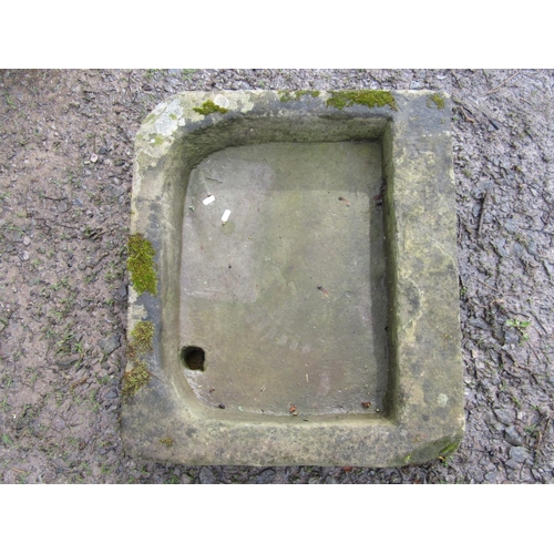 23 - A shallow but thick walled natural stone rectangular sink/trough with rounded front corners 72 cm wi... 