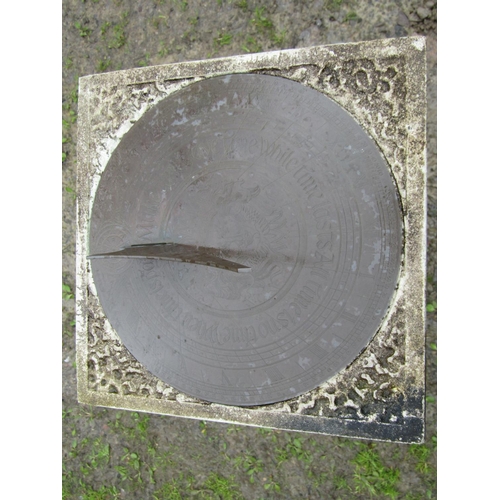 29 - A weathered contemporary sun dial, the loose engraved circular plate with shaped gnomon raised on a ... 