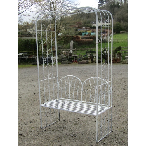 34 - A cream painted light steel sectional garden arbour, with repeating open leaf patterned design and e... 